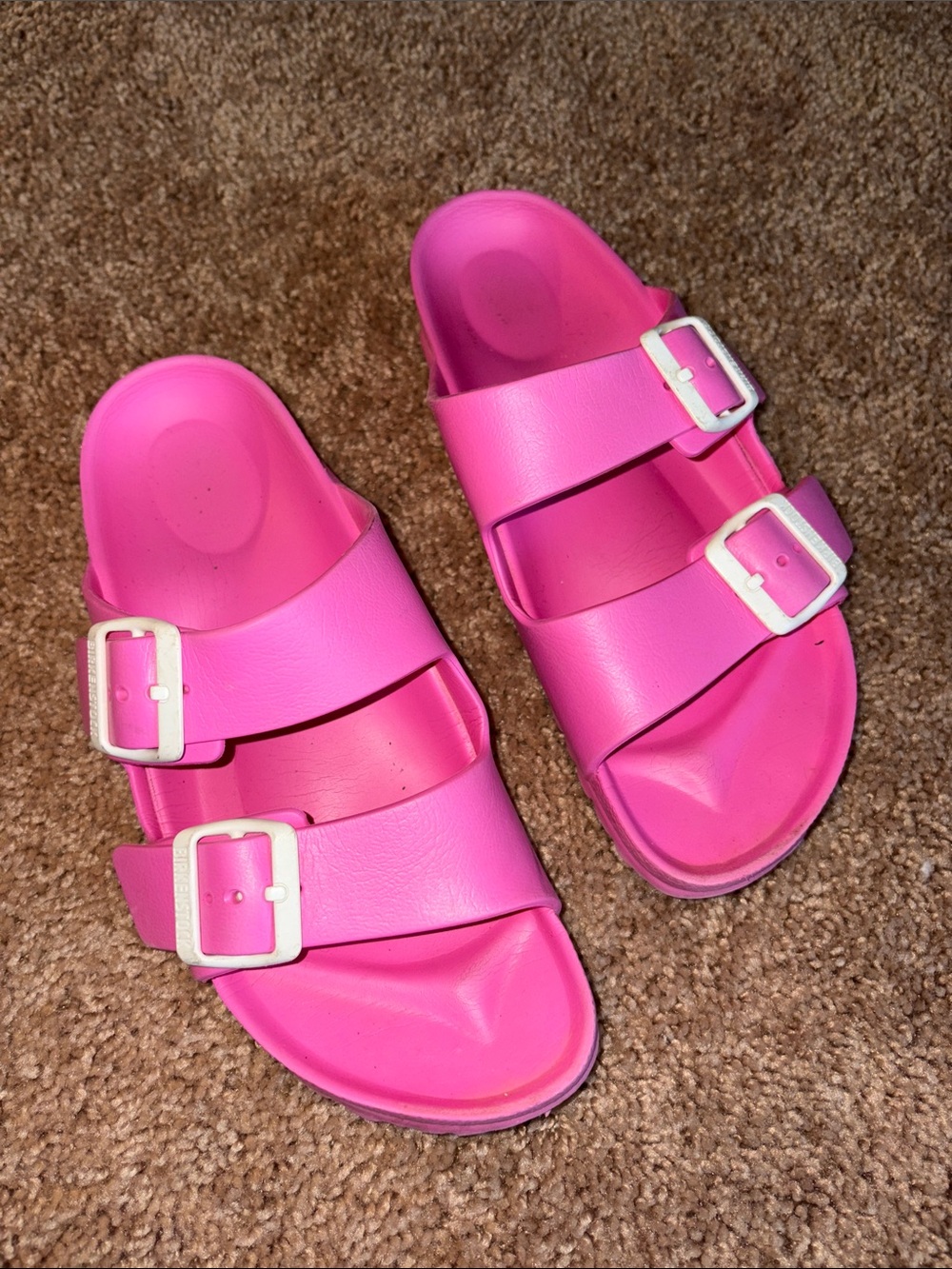 Birkenstock women’s pink plastic sandals